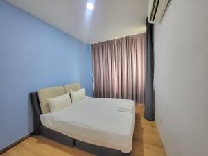 Postel nebo postele na pokoji v ubytování Roxy Hotel & Apartments