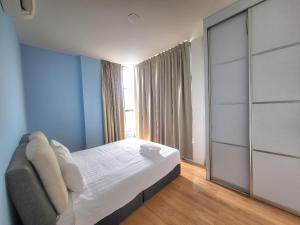 Postel nebo postele na pokoji v ubytování Roxy Hotel & Apartments