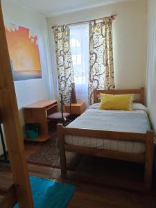 Postel nebo postele na pokoji v ubytování Tipico Hostel Chile