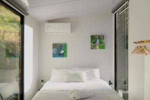 Katil atau katil-katil dalam bilik di Cosy Dell by Tiny Away