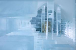 a distorted picture of a building with stairs in it at Ice Hotel in Jukkasjärvi