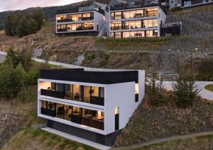 an aerial view of a house on a hill at The Bunker Alpha B in Queenstown