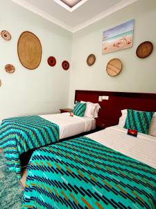 Postel nebo postele na pokoji v ubytování Sea Crest Hotel + 37 fotografií
