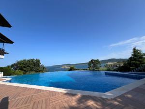 a swimming pool in a villa with a view at Saint Thomas Holiday Village Condo in Sozopol