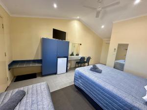 Postel nebo postele na pokoji v ubytování Moura Motel