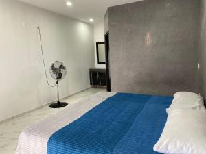 Postel nebo postele na pokoji v ubytování Hotel Arcangeles