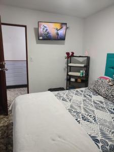 Ένα ή περισσότερα κρεβάτια σε δωμάτιο στο Hostal Marhú