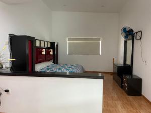 Postel nebo postele na pokoji v ubytování Hotel Casa Bendicion