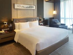 Postel nebo postele na pokoji v ubytování Crowne Plaza Zhangzhou by IHG