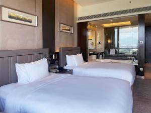 Postel nebo postele na pokoji v ubytování Crowne Plaza Zhangzhou by IHG