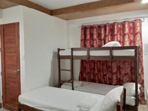 Postel nebo postele na pokoji v ubytování JCV Rooms