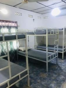 Postel nebo postele na pokoji v ubytování Trinco Be Cool Hostel
