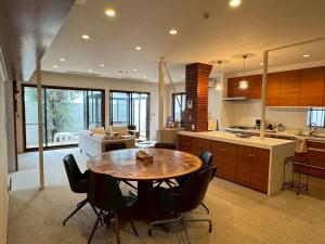 a kitchen and dining room with a table and chairs at and CITY三軒茶屋 in Tokyo