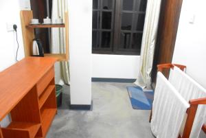 Ένα ή περισσότερα κρεβάτια σε δωμάτιο στο Ansi Villa
