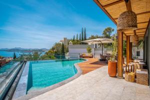 an infinity pool in a villa with a view at Villa Onya in Bodrum City