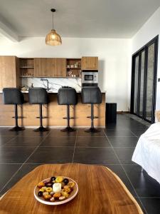 Kuchyň nebo kuchyňský kout v ubytování Villa Ti Rati - Vue mer exceptionnelle sur Saint Leu