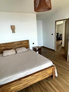 Postel nebo postele na pokoji v ubytování Villa Ti Rati - Vue mer exceptionnelle sur Saint Leu
