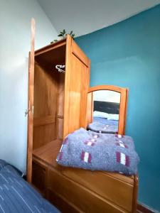 Letto o letti in una camera di Rustic House in the Heart of Cusco