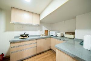 Una cocina o cocineta en 柃居 B&B - Jing'an Temple Branch