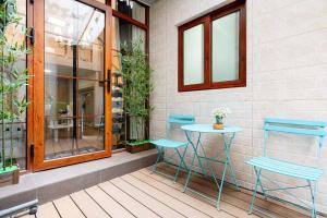 Un balcón o terraza en 柃居 B&B - Jing'an Temple Branch
