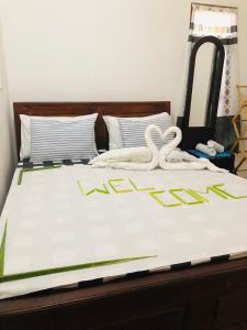 Tempat tidur dalam kamar di Trinco Be Cool Hostel