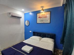 Postel nebo postele na pokoji v ubytování BOSS Hotel