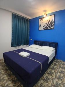Postel nebo postele na pokoji v ubytování BOSS Hotel
