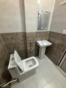 Koupelna v ubytování Hotel Devyatra