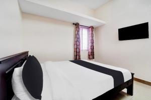 TV a/nebo společenská místnost v ubytování Super Hotel O Viswapuram
