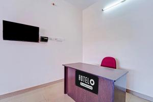 TV a/nebo společenská místnost v ubytování Super Hotel O Viswapuram