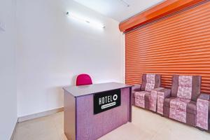 Posezení v ubytování Super Hotel O Viswapuram