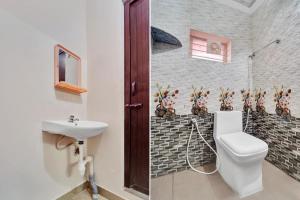 Koupelna v ubytování Super Hotel O Viswapuram