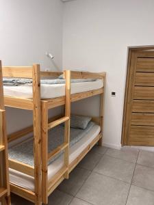 Postel nebo postele na pokoji v ubytování Golden Hostel