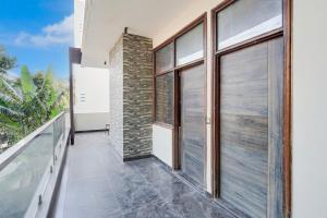Balkón nebo terasa v ubytování Super Collection O Sector 108 Noida + 21 fotografií