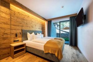 Postel nebo postele na pokoji v ubytování MULIN Appartements