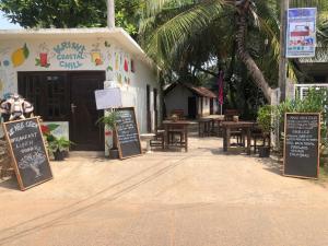 Sertifikat, penghargaan, tanda, atau dokumen yang dipajang di Trinco Be Cool Hostel