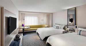 Voodi või voodid majutusasutuse Hotel Olive Aero Suites Near Delhi Airport toas
