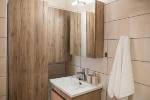 Ένα μπάνιο στο Nerida Beach Apartment