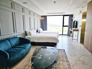 Posteľ alebo postele v izbe v ubytovaní Suncheon Hotel Gite