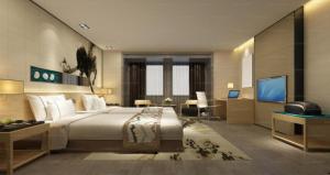 TV a/nebo společenská místnost v ubytování Airport Grand President Suites Near Delhi Airport + 21 fotografií