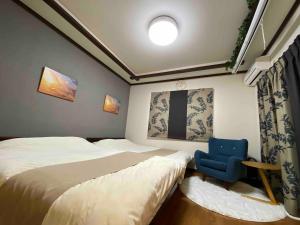 Postel nebo postele na pokoji v ubytování 箱根御泊処-桜華- 049aH