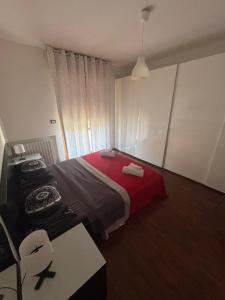 A bed or beds in a room at Dimora 14