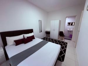 Postel nebo postele na pokoji v ubytování Private Room Ipoh Centre - Stay with host