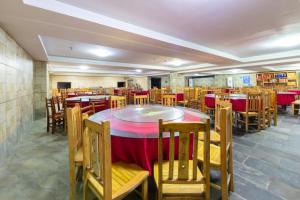 Reštaurácia alebo iné gastronomické zariadenie v ubytovaní Zhangjiajie Wulingju Hotel