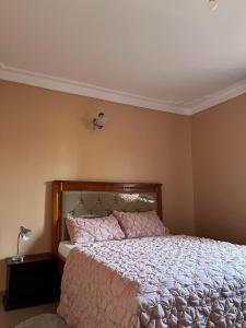 Ένα ή περισσότερα κρεβάτια σε δωμάτιο στο Flo Mcc