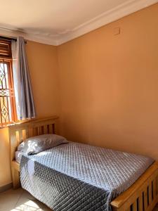 Ένα ή περισσότερα κρεβάτια σε δωμάτιο στο Flo Mcc