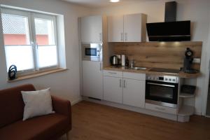 Kuchyň nebo kuchyňský kout v ubytování Apartment 67