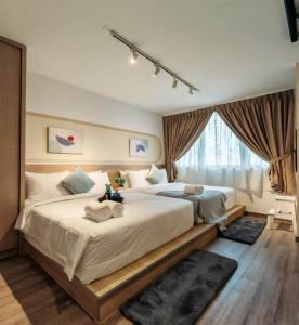 Residensi Agile Delima by Times 8 객실 침대