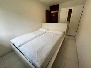 Postel nebo postele na pokoji v ubytování Hotel Belmont
