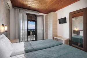 Postel nebo postele na pokoji v ubytování Panorama Dream studios apartments